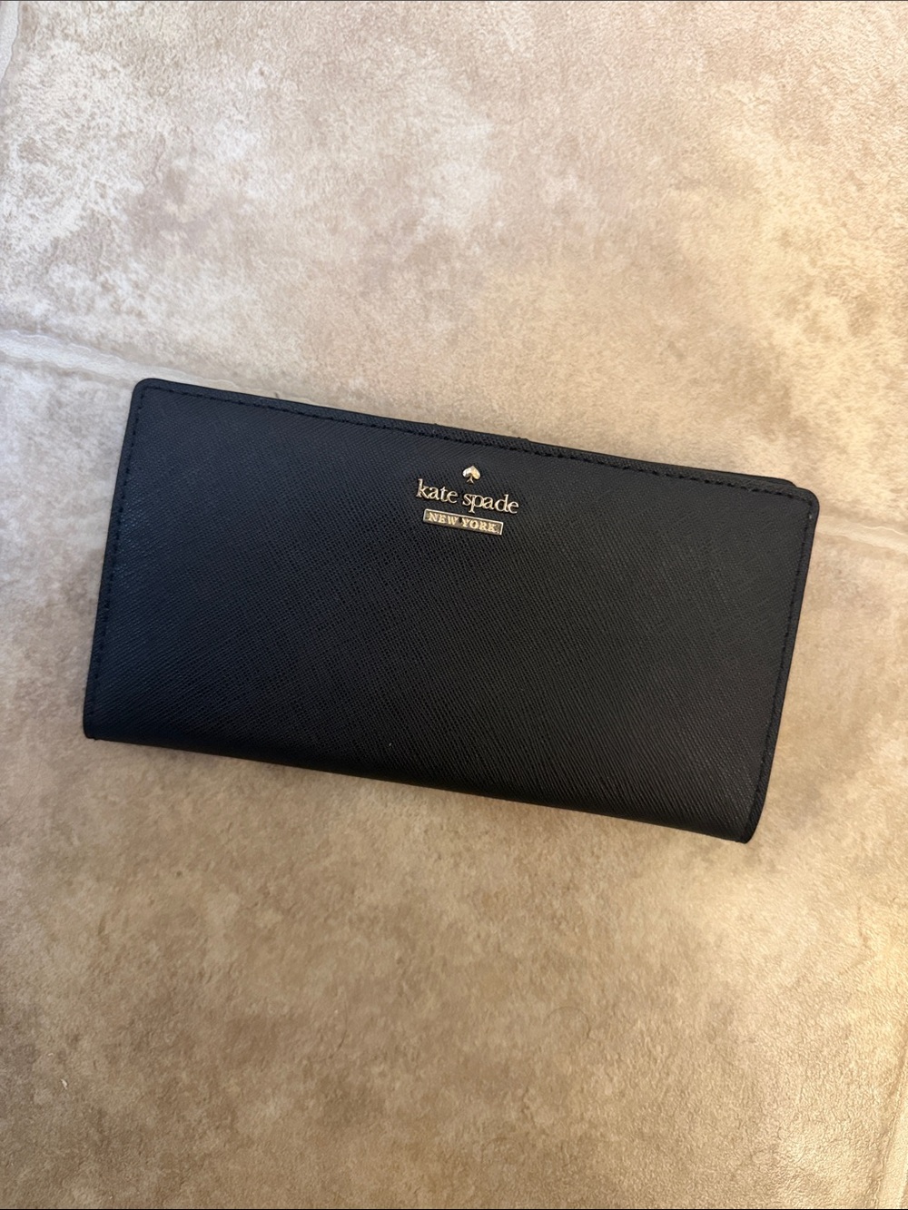 kate spade black continental zip-around wallet with gold logo